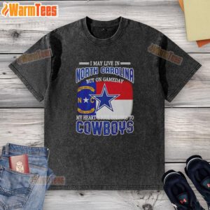 Alt Text: Washed t-shirt featuring 'I May Live In North Carolina But On Gameday My Heart Belongs To Dallas Cowboys' design.