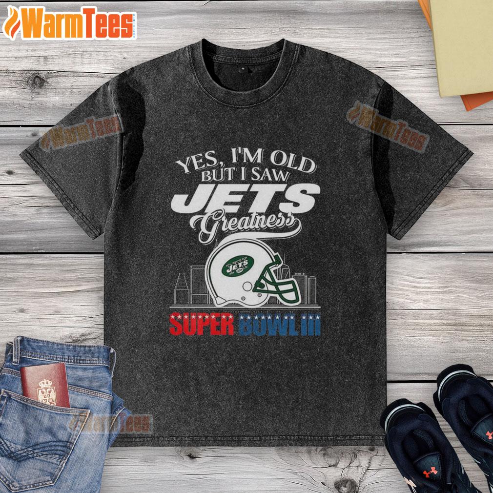 Alt Text: Original New York Jets Super Bowl III helmet skyline washed t-shirt, celebrating team greatness and nostalgia.