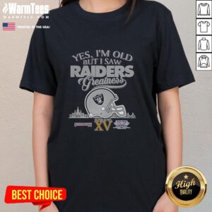 Alt Text: Ladies tee featuring 'Yes, I'm Old But I Oakland Raiders Greatness' design with Super Bowl helmet and skyline.