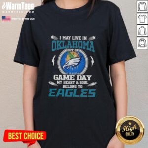 Premium ladies tee featuring 'I May Live In Oklahoma But On Game Day My Heart Belongs To Philadelphia Eagles' design.