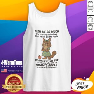 Adorable Maine Coon cat in a tank top, showcasing its playful personality and charm in a cozy setting.