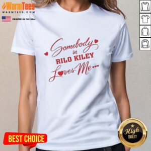 Alt Text: Rilo Kiley Loves Me Ladies Tee featuring a stylish graphic design, perfect for fans of Rilo Kiley and trendy apparel.