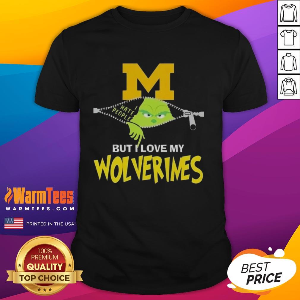 Alt Text: Awesome Grinch Christmas T-Shirt featuring Michigan Wolverines logo, perfect for festive fans celebrating the holidays.