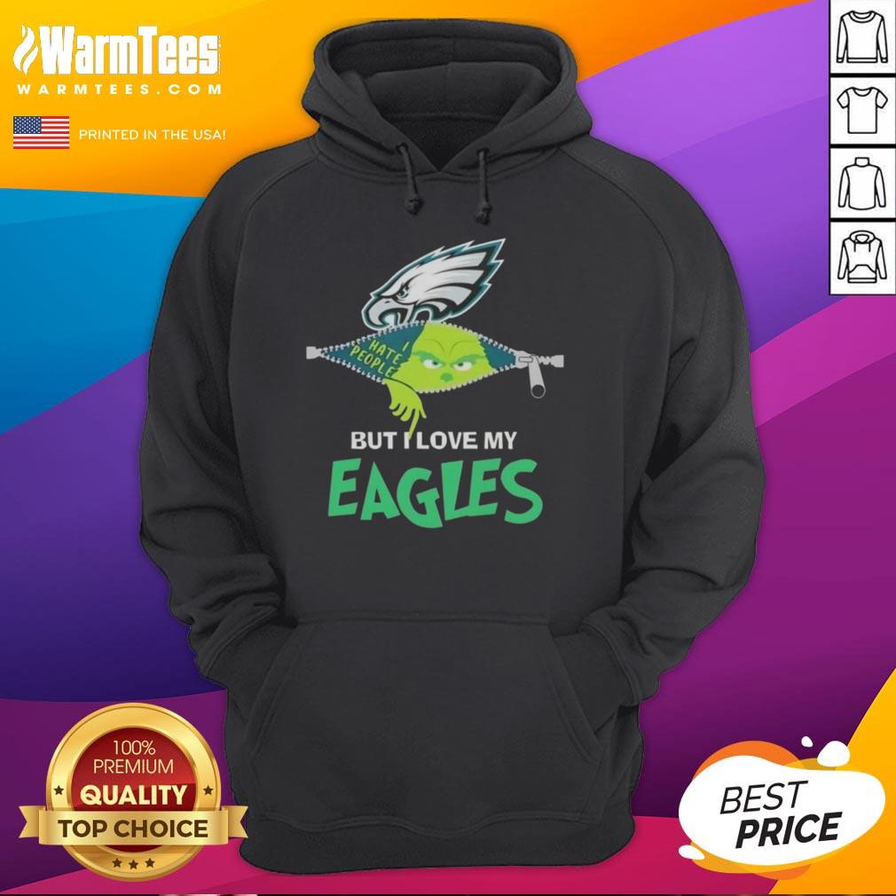 Person wearing an Awesome Grinch Christmas hoodie, proudly supporting the Philadelphia Eagles during the holiday season.