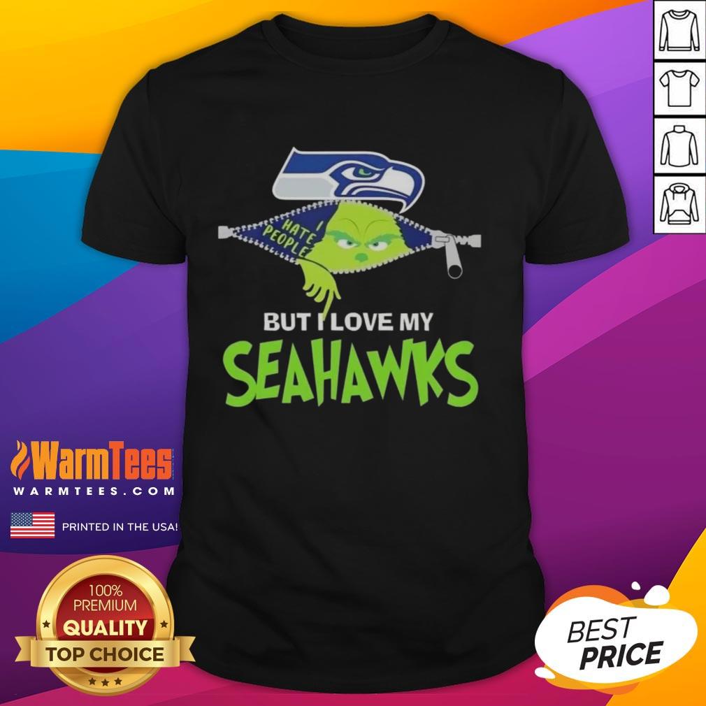 Awesome Grinch Christmas T-Shirt featuring Seattle Seahawks logo, perfect for festive fans celebrating the holidays.