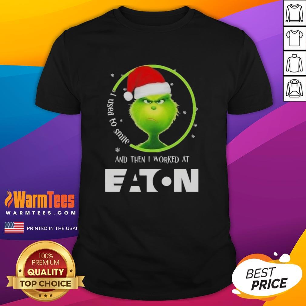 Alt Text: Awesome Grinch Christmas t-shirt featuring 'I Used To Smile And Then I Worked At Eaton Corporation' design.