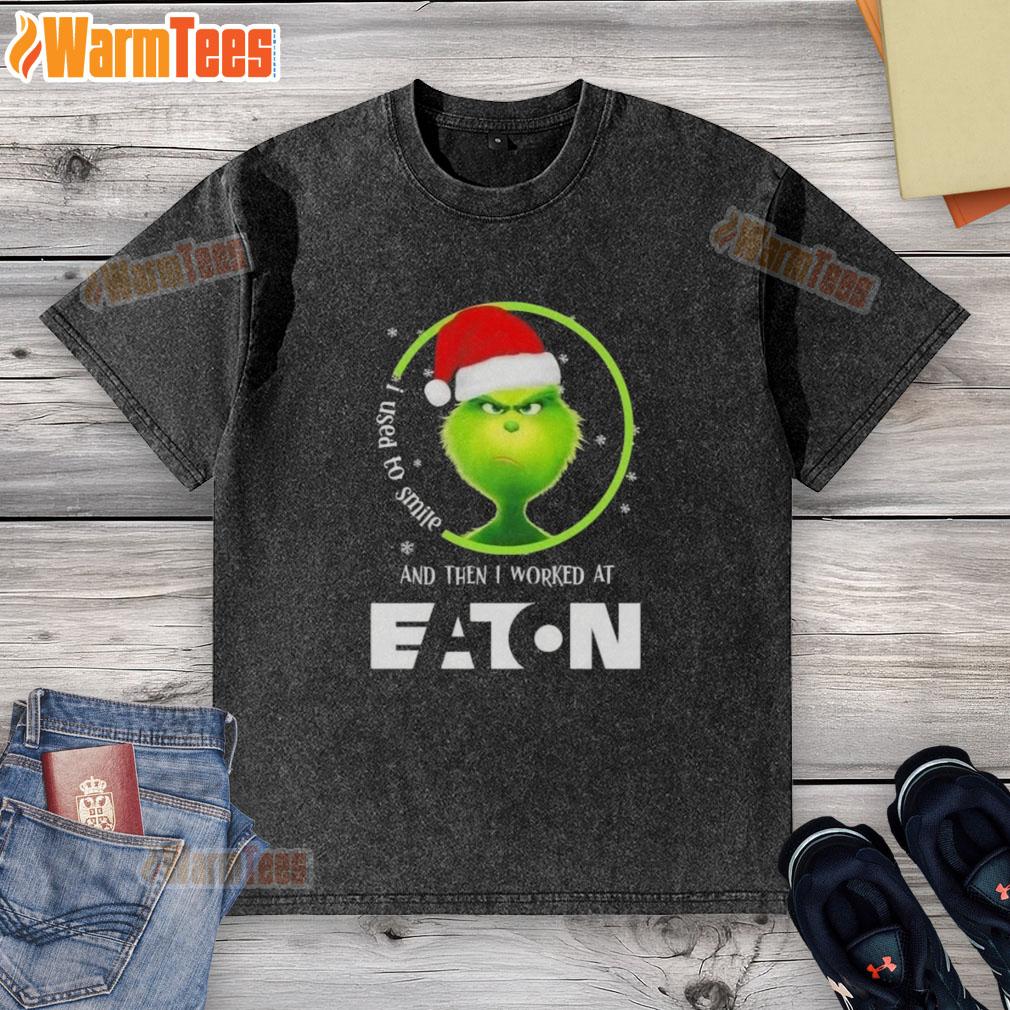 Awesome Grinch Christmas t-shirt featuring a humorous design about working at Eaton Corporation, perfect for holiday cheer.