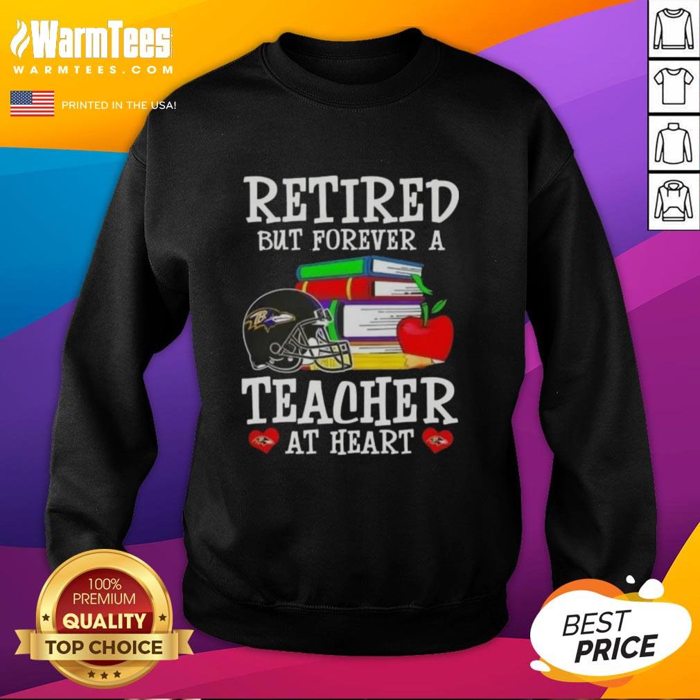Awesome retired but forever a teacher at heart Baltimore Ravens football sweatshirt, perfect for fans and educators.