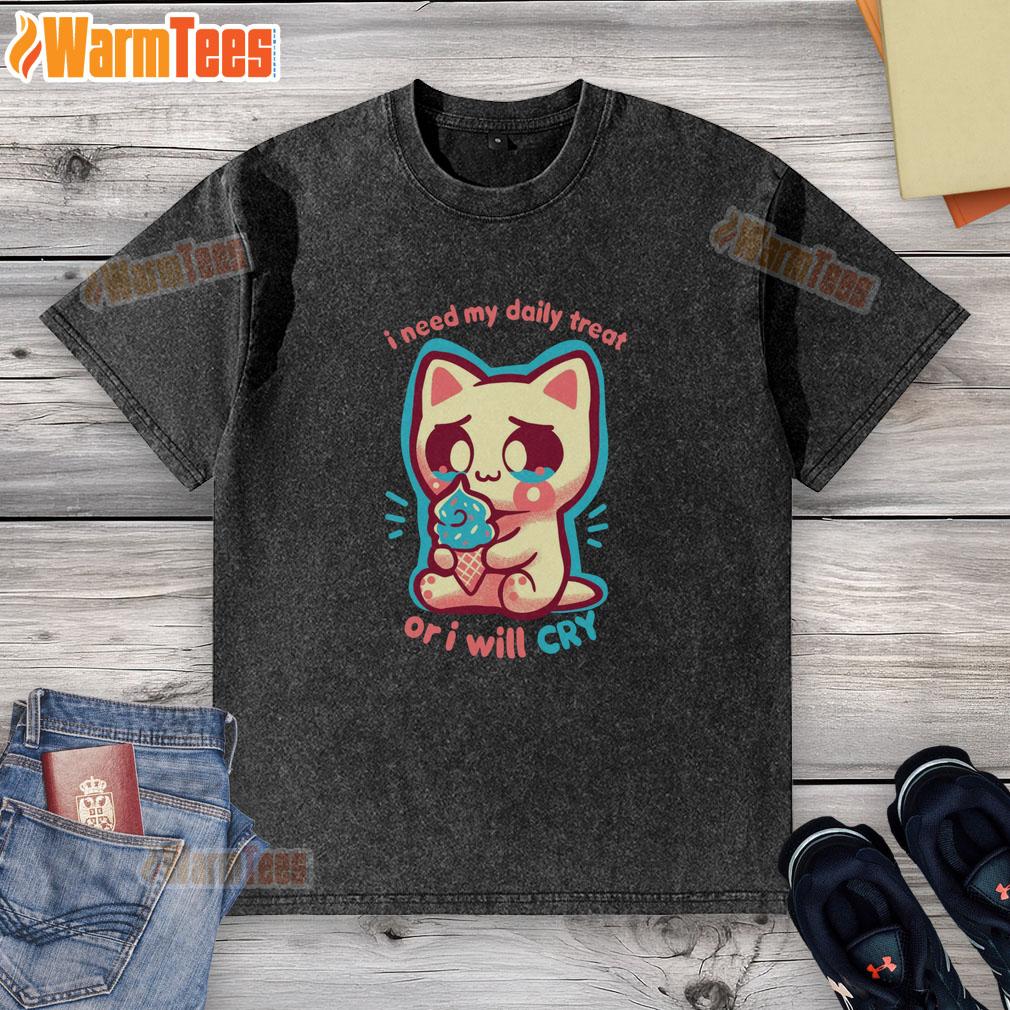Alt Text: Adorable cat wearing a 'I Need My Daily Treat Or I'll Cry' washed T-shirt, showcasing its playful personality.