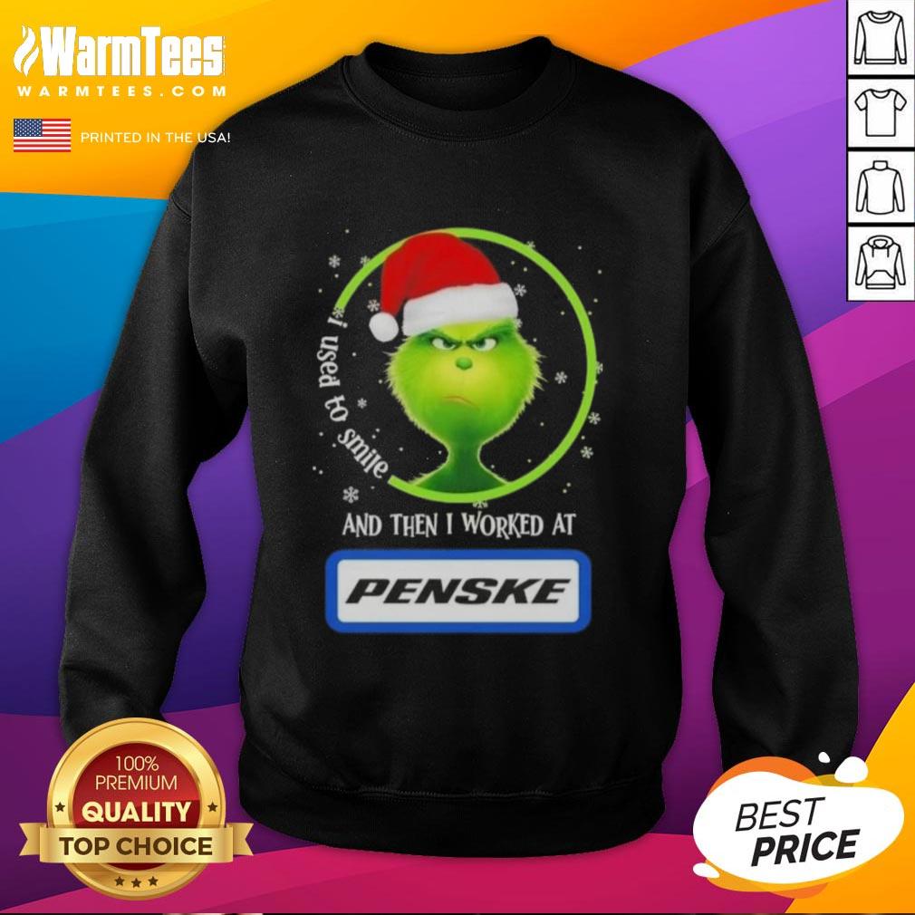Alt Text: Funny Grinch Christmas sweatshirt with I Used to Smile and Then I Worked at Penske Corporation text design.