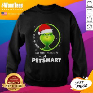 Alt Text: Funny Grinch Christmas sweatshirt with 'I Used to Smile and Then I Worked at PetSmart' text, perfect for holiday humor.