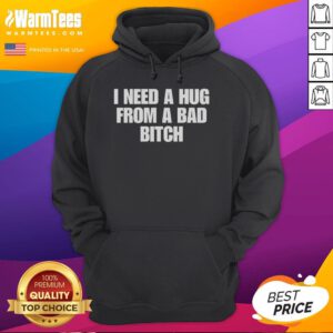 Alt Text: Funny 'I Need A Hug From A Bad Bitch' hoodie displayed on a model, showcasing trendy streetwear style.