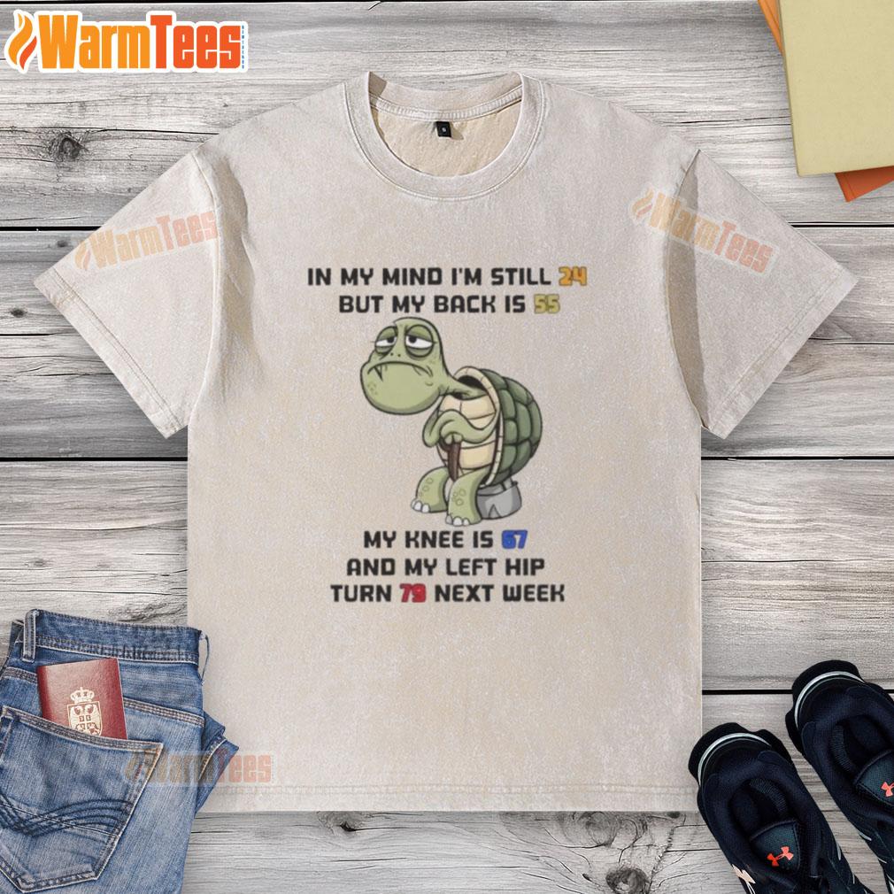 Funny turtle wearing a washed t-shirt, humorously reflecting on aging with I'm still 24, but my back is 55 text.