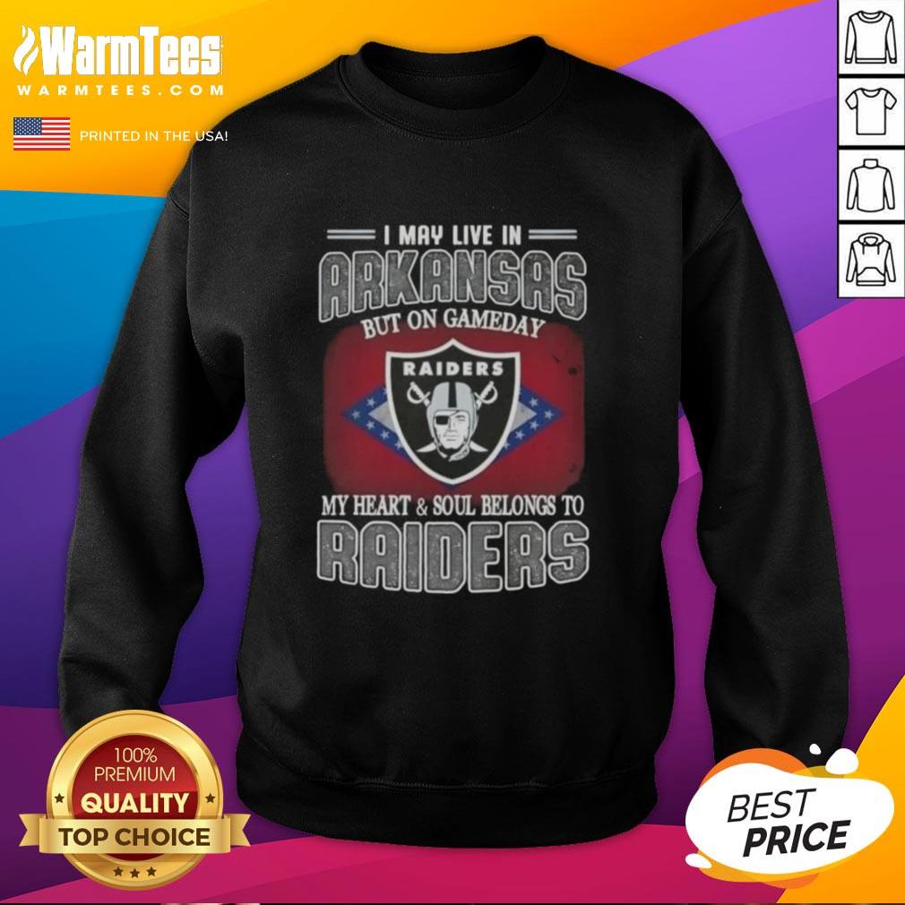 Cozy sweatshirt reading 'I May Live In Arkansas But On Gameday My Heart And Soul Belongs To Raiders' in vibrant colors.