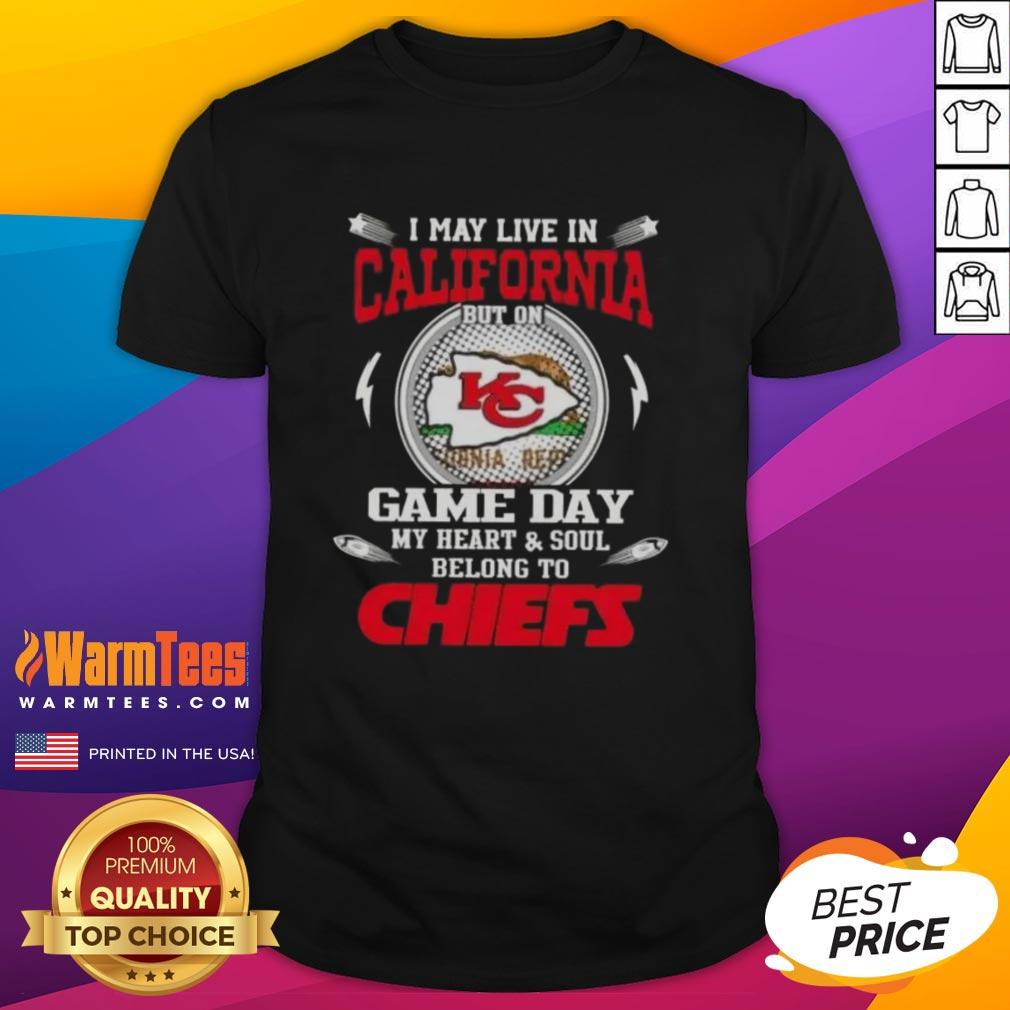 California fan wearing a Kansas City Chiefs T-shirt, showcasing team spirit on game day with a heart and soul message.