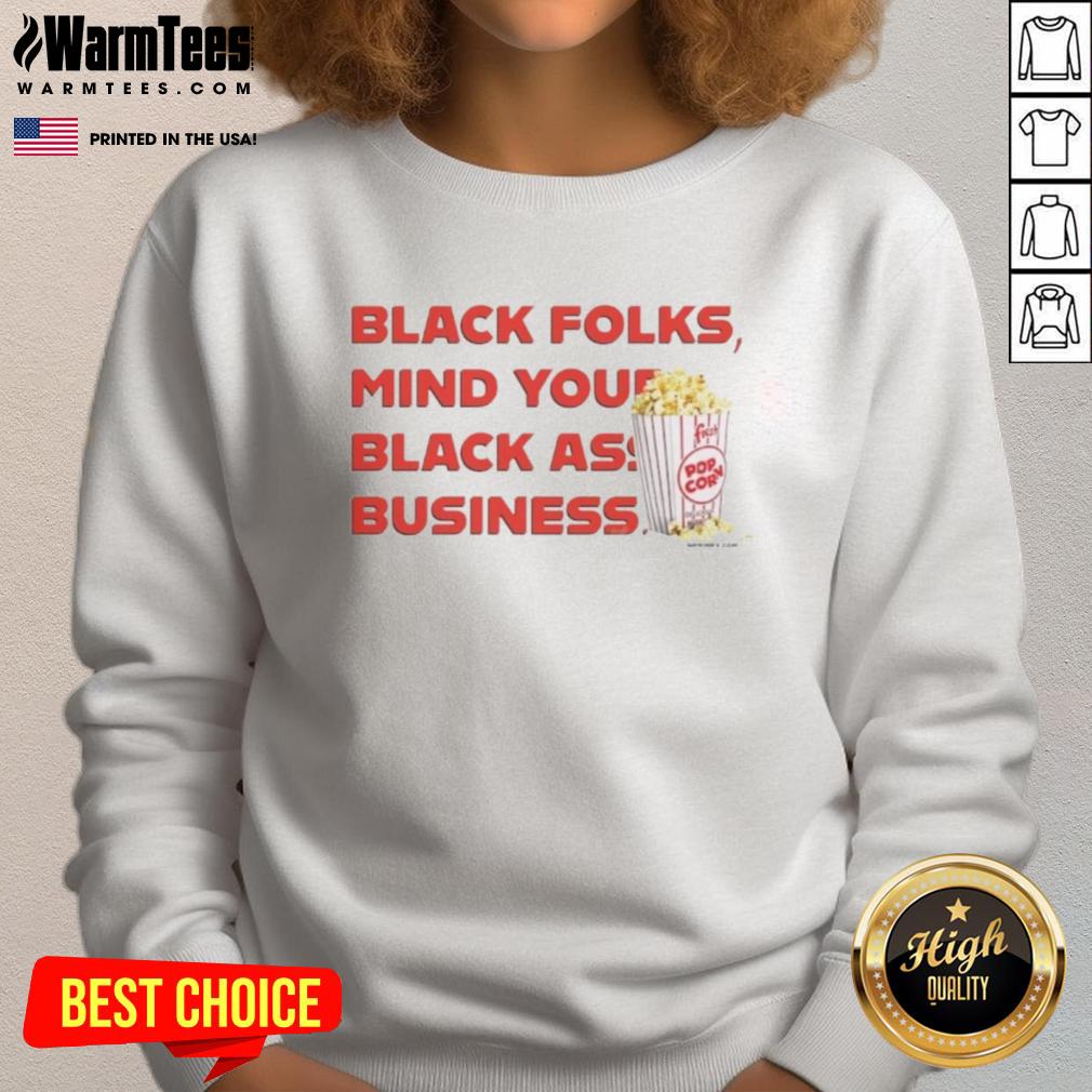 Black sweatshirt with 'Mind Your Black Ass Business' slogan, perfect for stylish comfort and cultural expression.