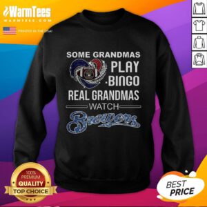 Grandmas in a Milwaukee Brewers baseball sweatshirt enjoy a game, showcasing love for baseball over bingo.