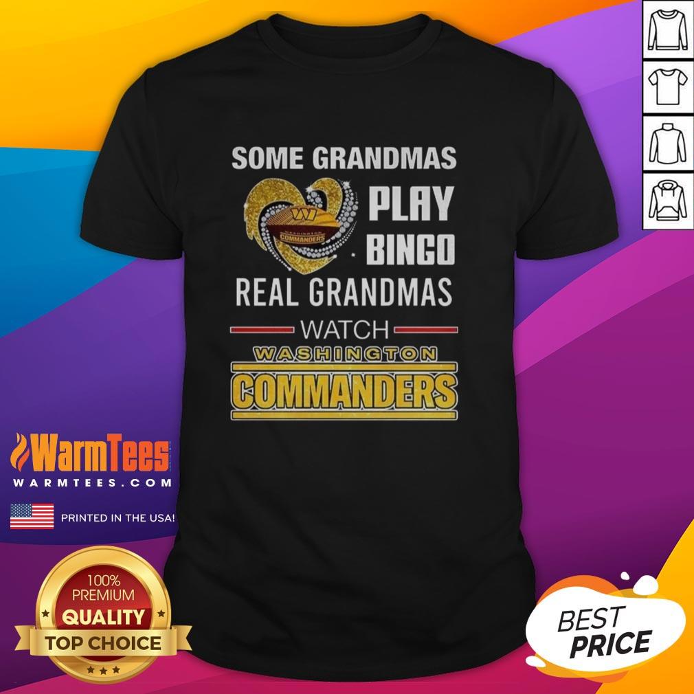 Grandma wearing a 'Real Grandmas Watch Washington Commanders Football' T-shirt while enjoying a game day with friends.