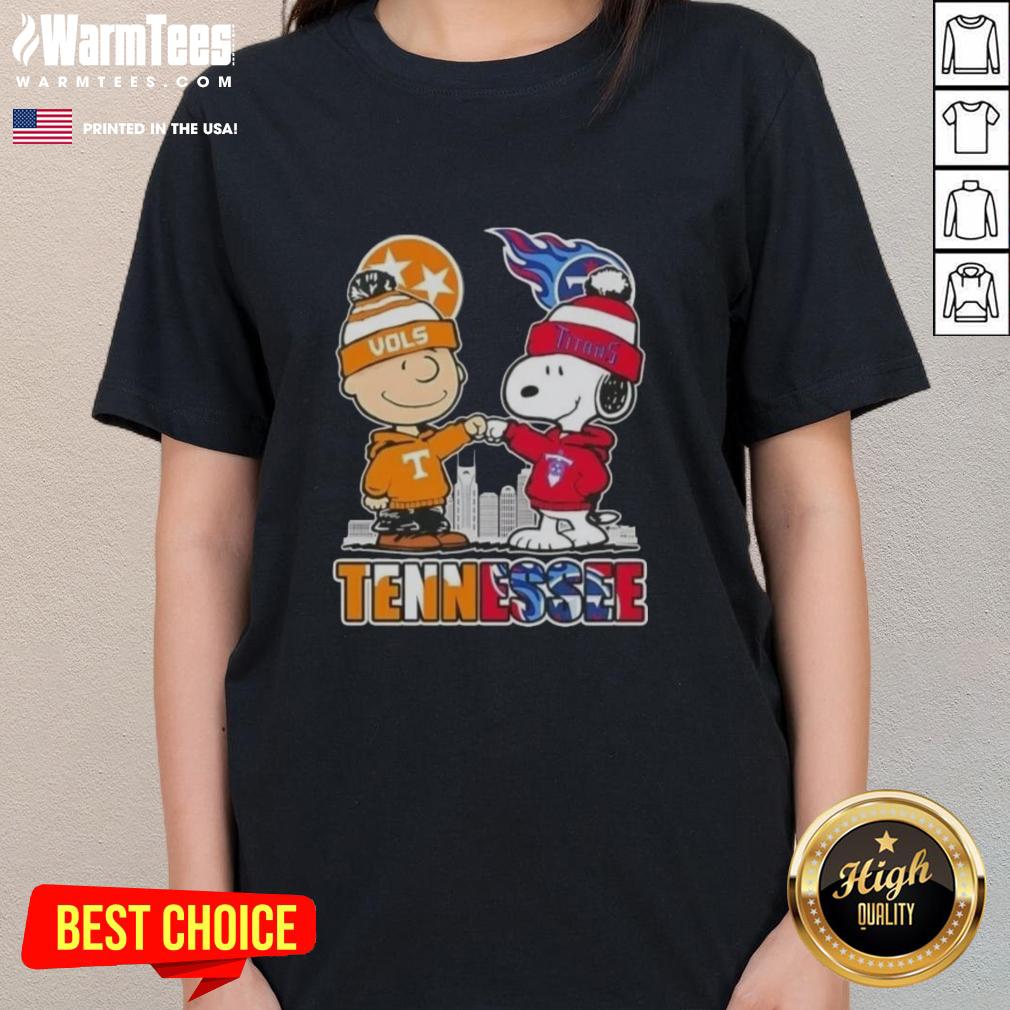 Premium Charlie Brown and Snoopy Tennessee Vols x Titans skyline ladies tee featuring vibrant colors and playful design.