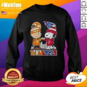 Alt Text: Premium Charlie Brown and Snoopy Tennessee Vols x Titans skyline sweatshirt featuring vibrant colors and fun design.