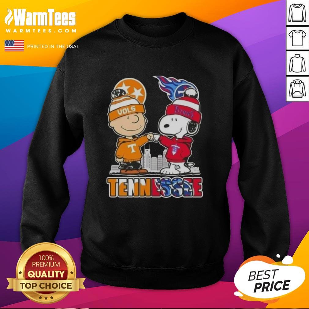 Alt Text: Premium Charlie Brown and Snoopy Tennessee Vols x Titans skyline sweatshirt featuring vibrant colors and fun design.
