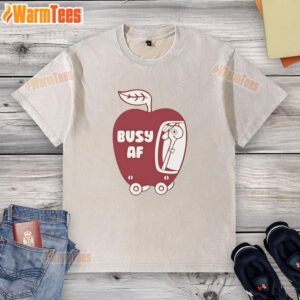 Premium top featuring a busy AF graphic on a washed apple T-shirt, perfect for casual and trendy outfits.