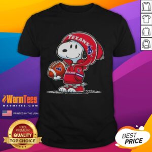 Alt Text: Cute Snoopy in a Houston Texans hoodie smiles at fans, showcasing a fun t-shirt design featuring Peanuts characters.