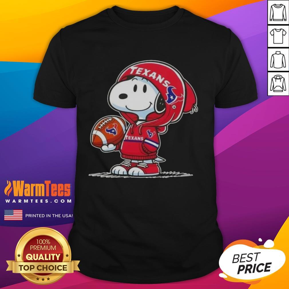 Alt Text: Cute Snoopy in a Houston Texans hoodie smiles at fans, showcasing a fun t-shirt design featuring Peanuts characters.