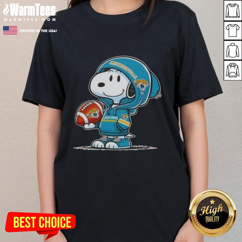 Cute Peanuts Snoopy in a Jacksonville Jaguars hoodie, smiling at fans on a ladies tee design.