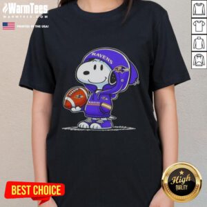 Good Peanuts Snoopy in a hoodie smiling at fans, showcasing Baltimore Ravens pride on a ladies' tee.
