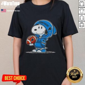 Alt Text: Snoopy in a Carolina Panthers hoodie smiles at fans on a ladies tee featuring good peanuts design.