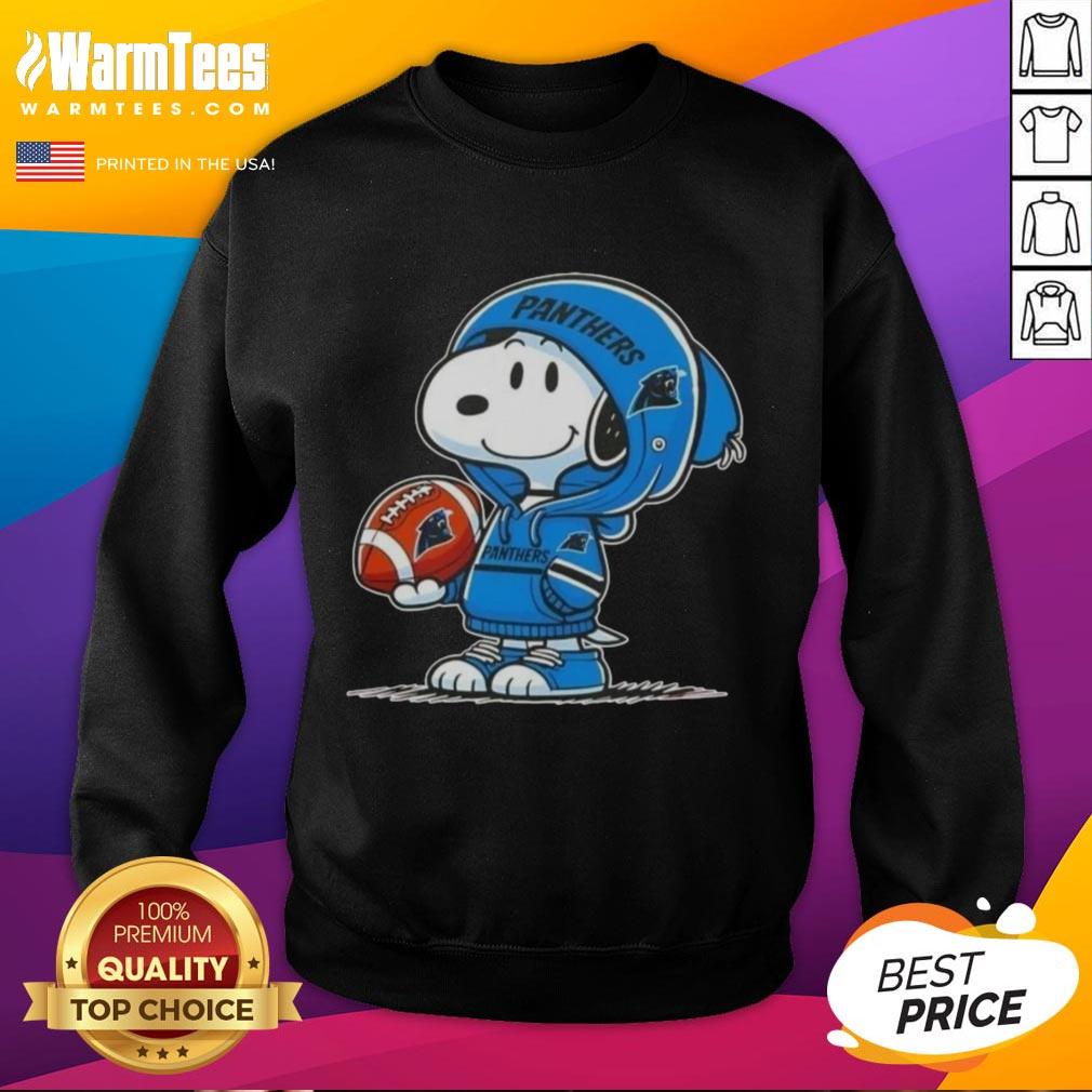 Good Peanuts Snoopy wearing a Carolina Panthers hoodie, smiling at fans in a cozy sweatshirt.