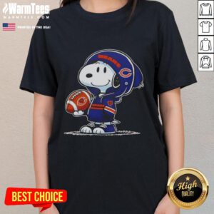 Alt Text: Snoopy in a Chicago Bears hoodie smiling at fans, featured on a ladies tee celebrating good peanuts and team spirit.