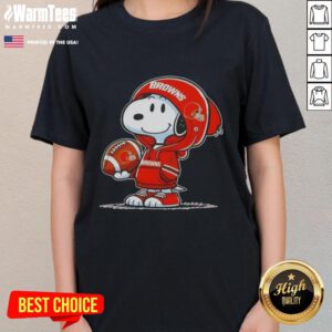 Snoopy wearing a Cleveland Browns hoodie smiles at fans, showcasing a Good Peanuts design on a ladies tee.