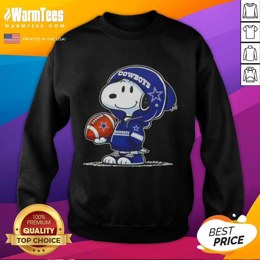 Snoopy wearing a Dallas Cowboys hoodie smiles at fans while showcasing a Good Peanuts sweatshirt design.