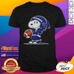 Alt Text: Snoopy in a hoodie smiling at fans on a Dallas Cowboys t-shirt featuring Good Peanuts characters.