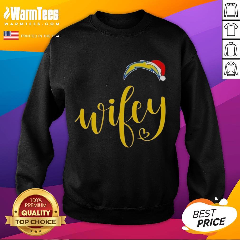 Happy Wifey sweatshirt featuring Los Angeles Chargers logo and festive Santa hat for a Merry Christmas celebration.