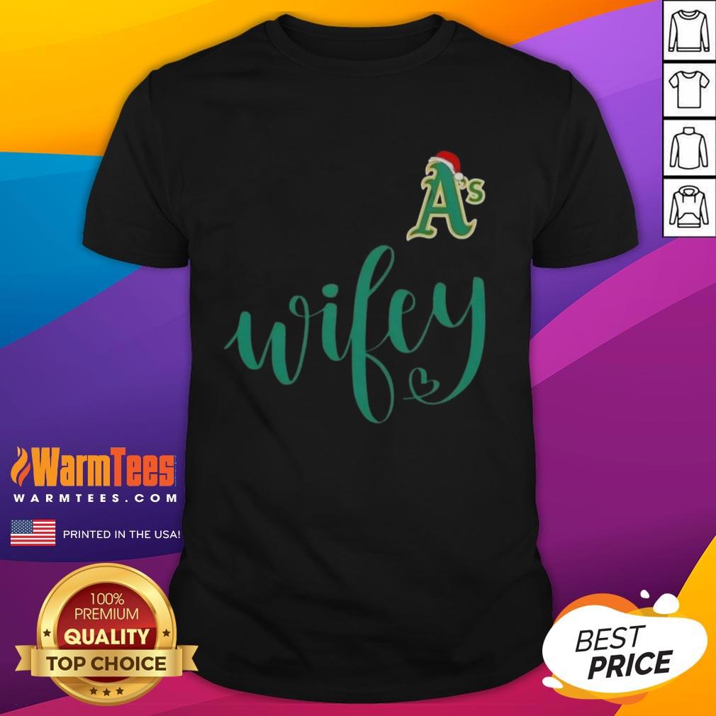Happy Wifey Oakland Athletics Santa Hat Merry Christmas T-Shirt featuring festive design for baseball fans during holidays.