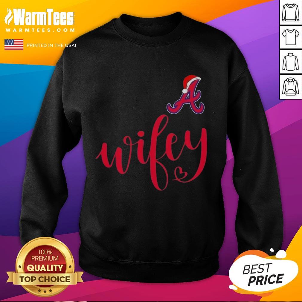 Hot Wifey Atlanta Braves sweatshirt in a festive Santa hat, perfect for a Merry Christmas celebration.