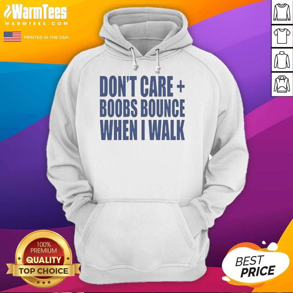 Woman wearing 'Nice Don't Care Boobs Bounce When I Walk' hoodie, showcasing a casual and confident style.