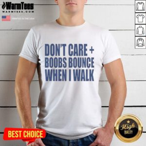 Alt Text: Woman wearing a 'Nice Don'T Care Boobs Bounce When I Walk' t-shirt, showcasing a fun and playful graphic design.