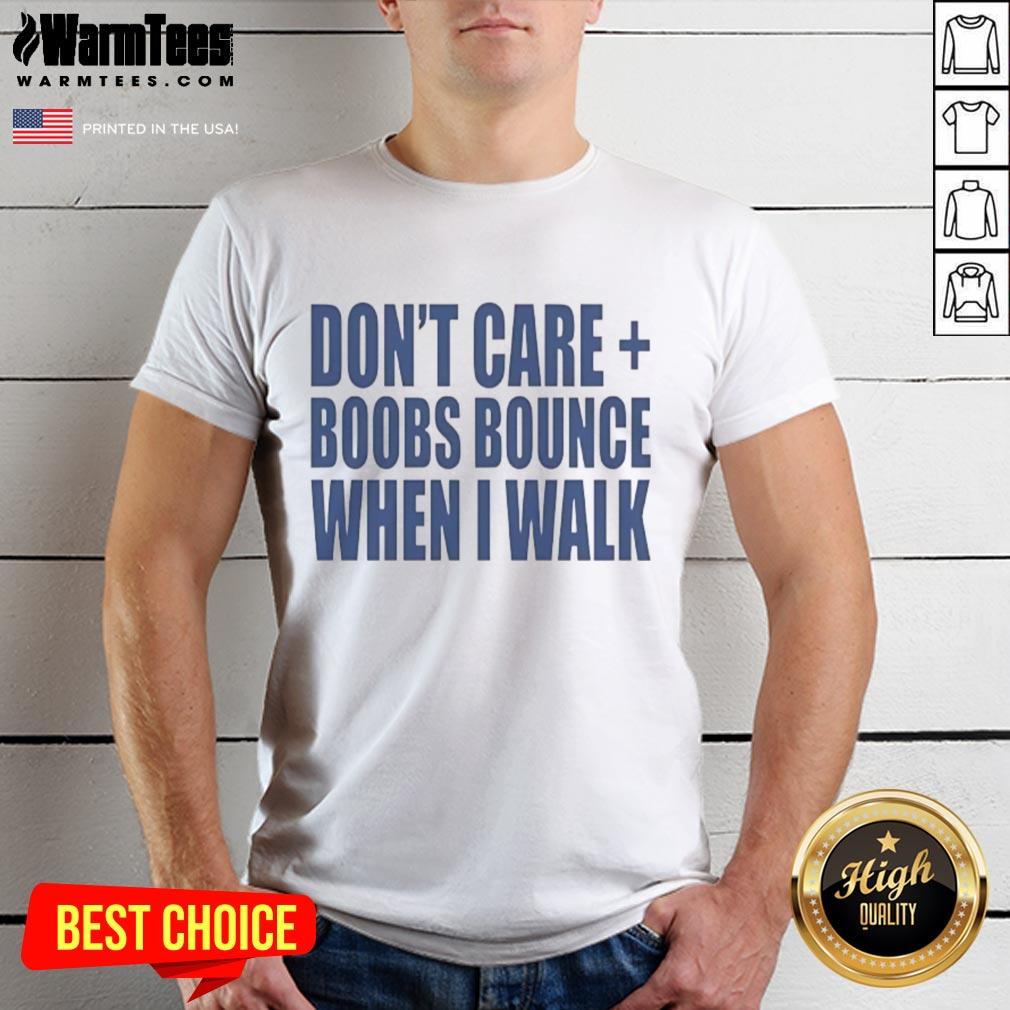 Alt Text: Woman wearing a 'Nice Don'T Care Boobs Bounce When I Walk' t-shirt, showcasing a fun and playful graphic design.