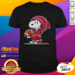 Alt Text: Snoopy in a hoodie smiles at fans, wearing an Arizona Cardinals t-shirt, showcasing fun peanuts character style.