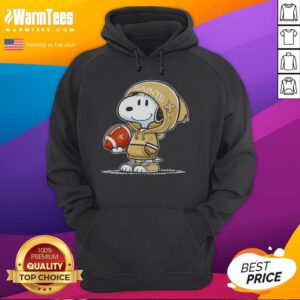 Snoopy wearing a New Orleans Saints hoodie smiles at fans, showcasing a fun and vibrant peanut character moment.