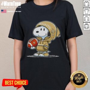 Snoopy in a hoodie, smiling at fans, showcasing Pretty Peanuts New Orleans Saints ladies tee design.