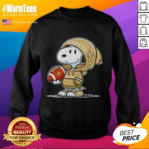 Snoopy in a hoodie with New Orleans Saints logo, smiling at fans while wearing a Pretty Peanuts sweatshirt.
