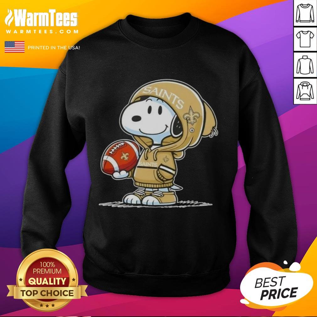 Snoopy in a hoodie with New Orleans Saints logo, smiling at fans while wearing a Pretty Peanuts sweatshirt.