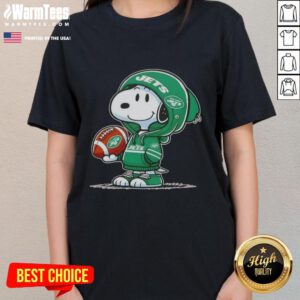 Alt Text: Snoopy in a New York Jets hoodie smiles at fans on a ladies' tee featuring pretty peanuts design.