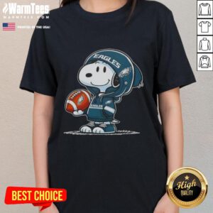 Pretty peanuts Snoopy in a Philadelphia Eagles hoodie, smiling at fans on a ladies tee design.