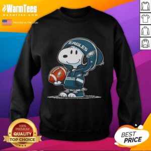 Alt Text: Snoopy in a Philadelphia Eagles hoodie smiles at fans, showcasing a fun Pretty Peanuts sweatshirt design.